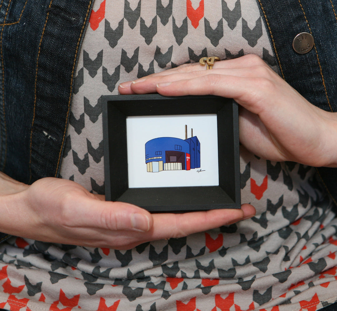 tiny prints of minnesota landmarks in handmade frames